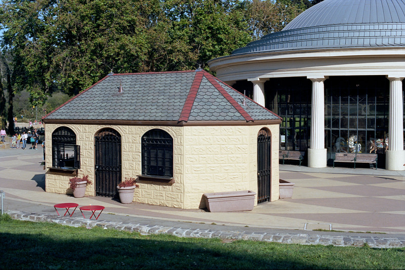 Carousel Ticket Office and Carousel; Grownups: 25 cents; Children: 5 cents; Babes in Arms: Free.