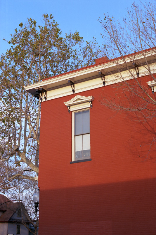 Red ochre brick building, built in Federalist period style. The Alameda, San José.